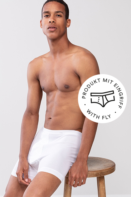 Noblesse series for men, white shorties on the model | mey®, icon for fly: briefs with outlined fly | mey®